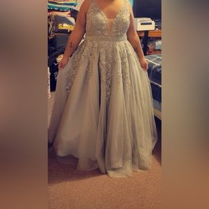 Silver ball gown prom dress size 18w worn once asking $600 obo